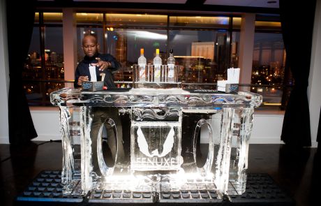 A 7ft ice bar with a logo carved into it with a CNC machine