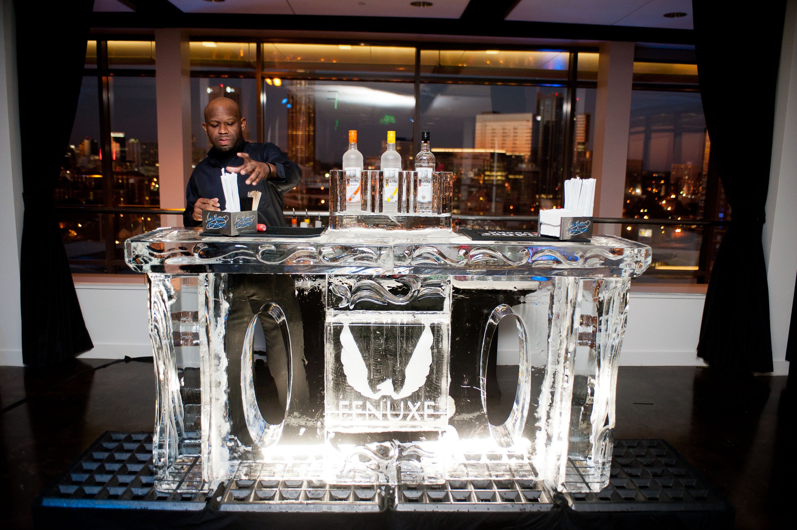 Fenuxe 50 Party by Kardon Events A 7ft ice bar with a logo carved into it with a CNC machine